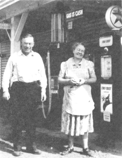 Hattie and Bill Mitchell in front of Lorane Service Station